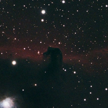 The Horsehead and Flame nebulae along with the bright star Alnitak