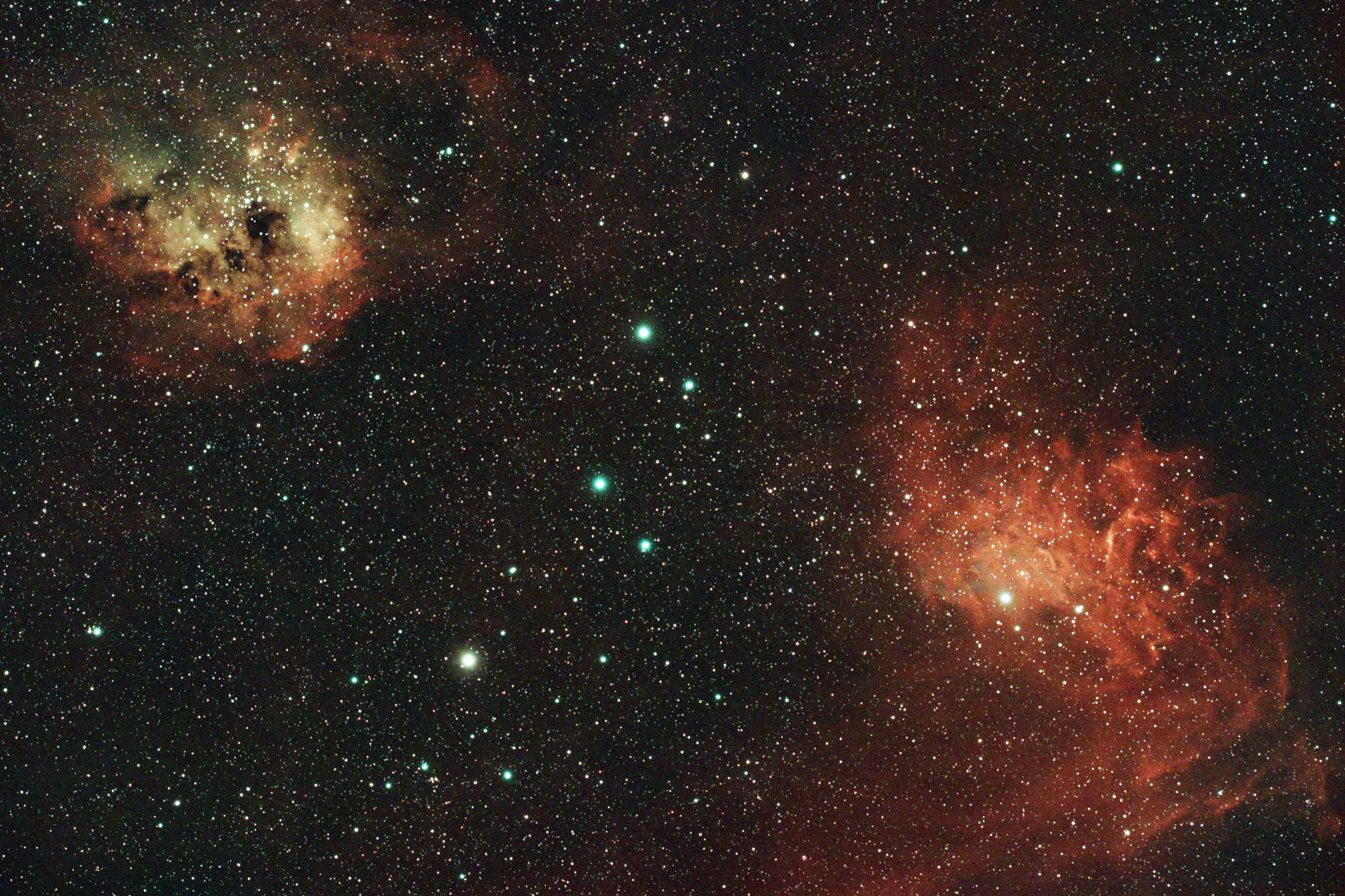 The tadpole nebula is in the top-left corner here, with the two tadpoles appearing to swim downward, and the flaming star nebula looking like a burning flare to the bottom-left of the image