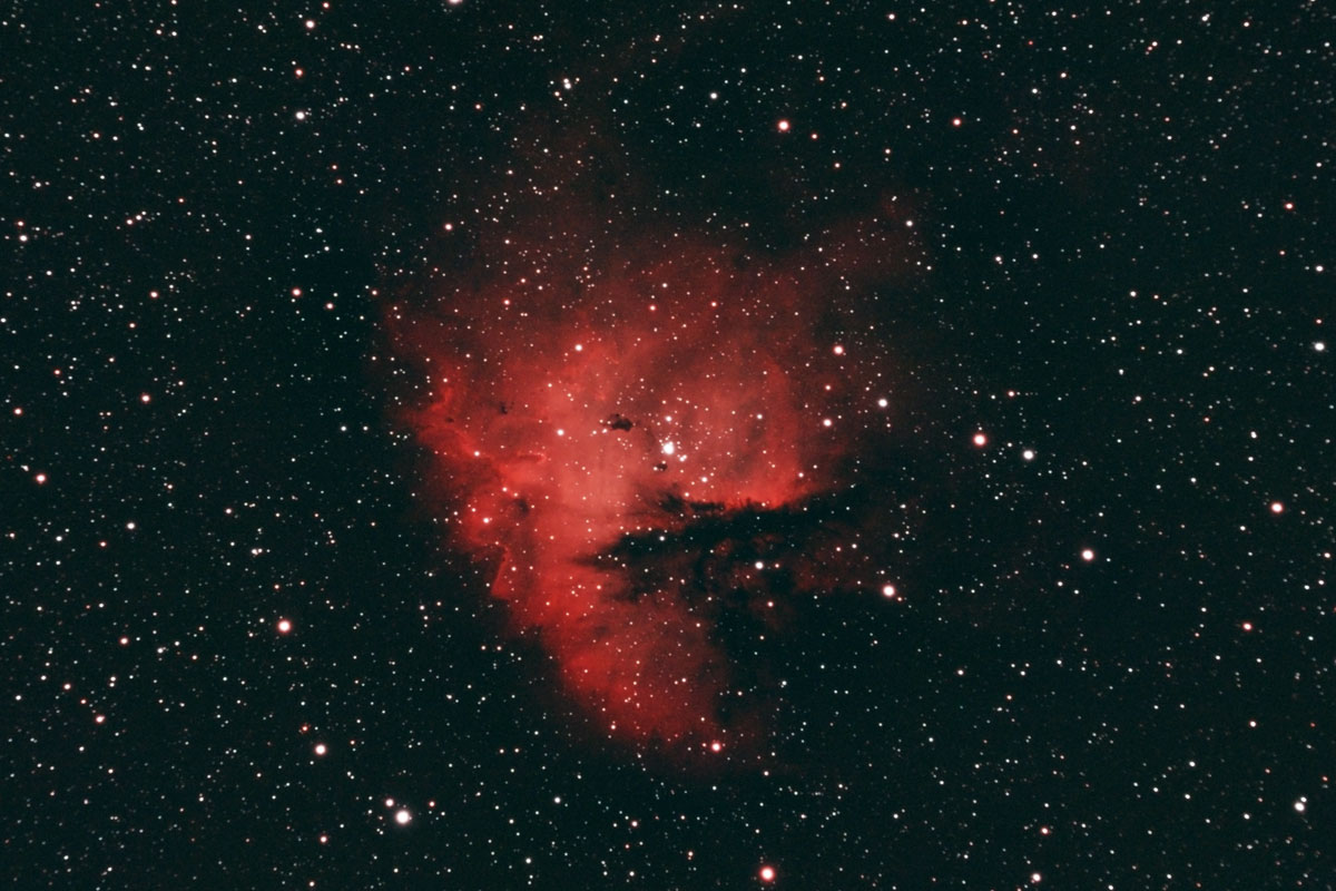 Image of the Pacman nebula, casted red by the dual-band filter
