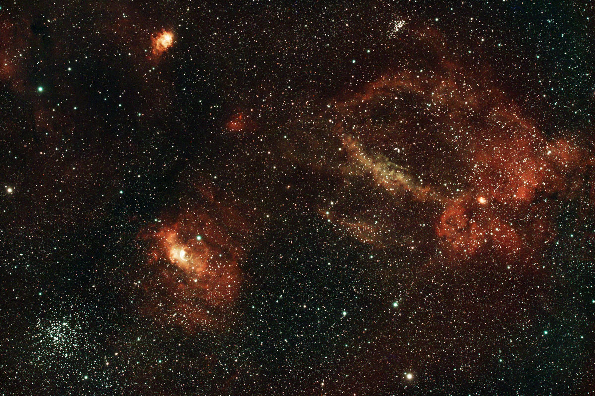 The large lobster claw nebula dominates the right half of this image, with the bubble nebula and scorpion cluster toward the bottom left